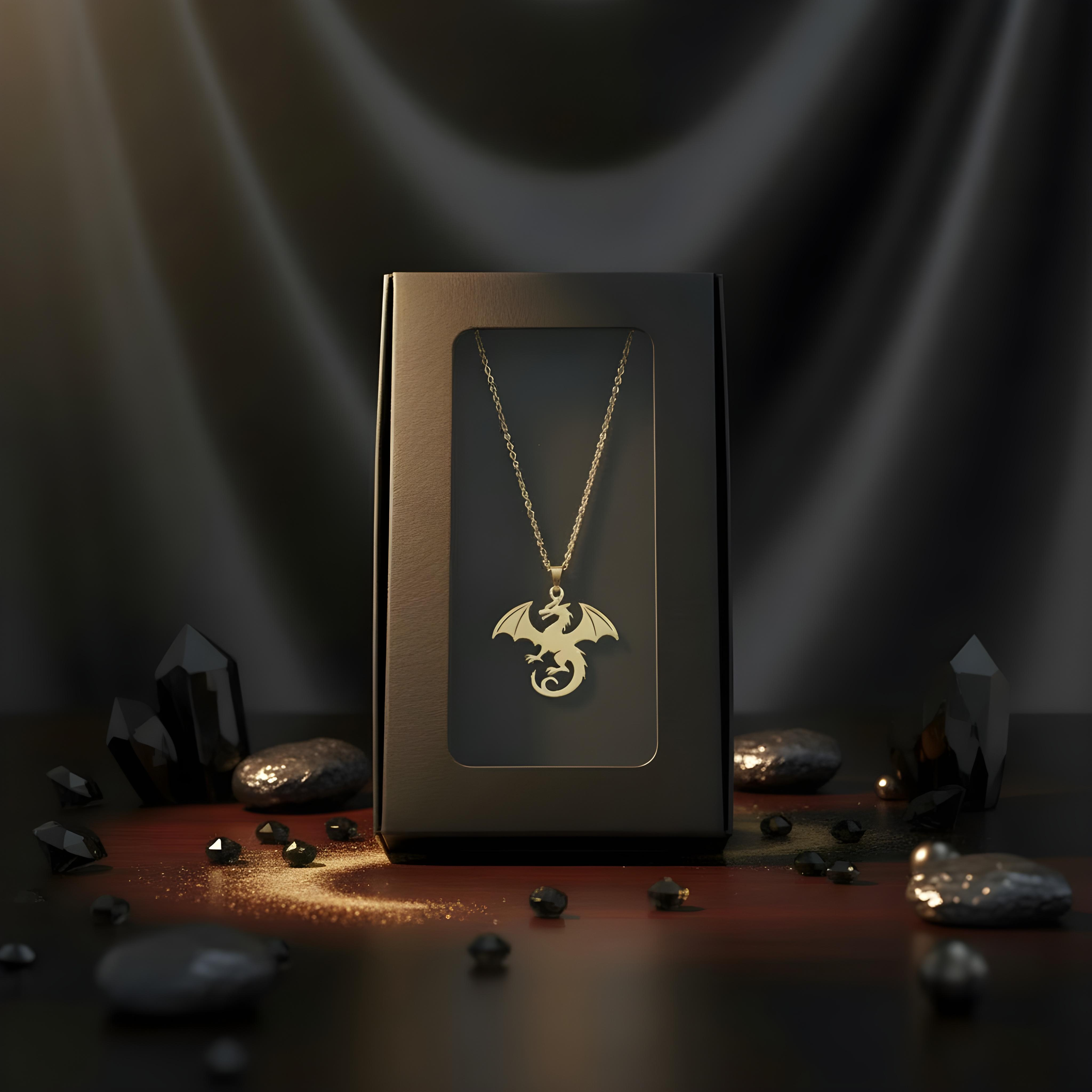 Gold dragon necklace in a black box with dark background