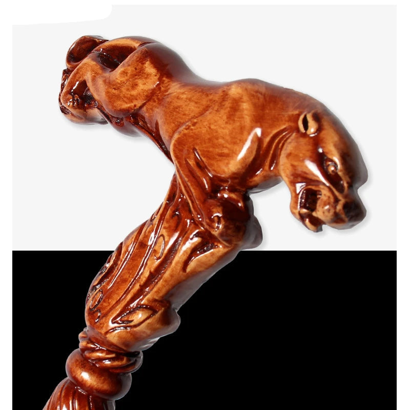 Wooden handle with horse carving on a white background