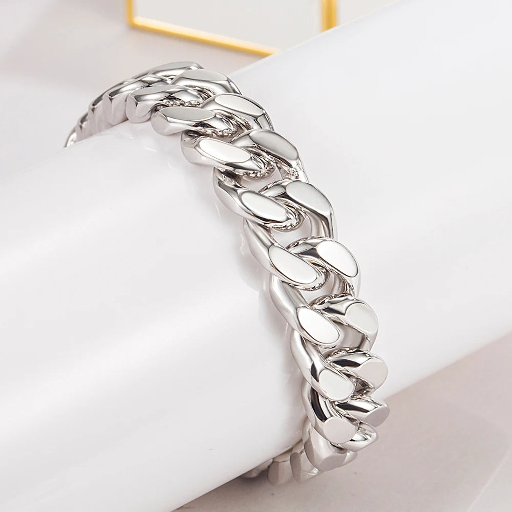 Silver chain bracelet on a white surface