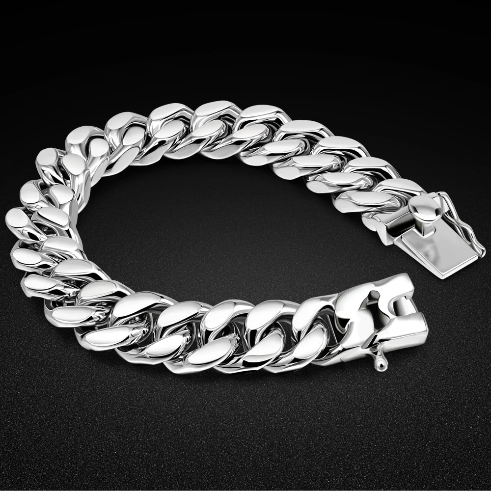 Silver chain bracelet on a black background