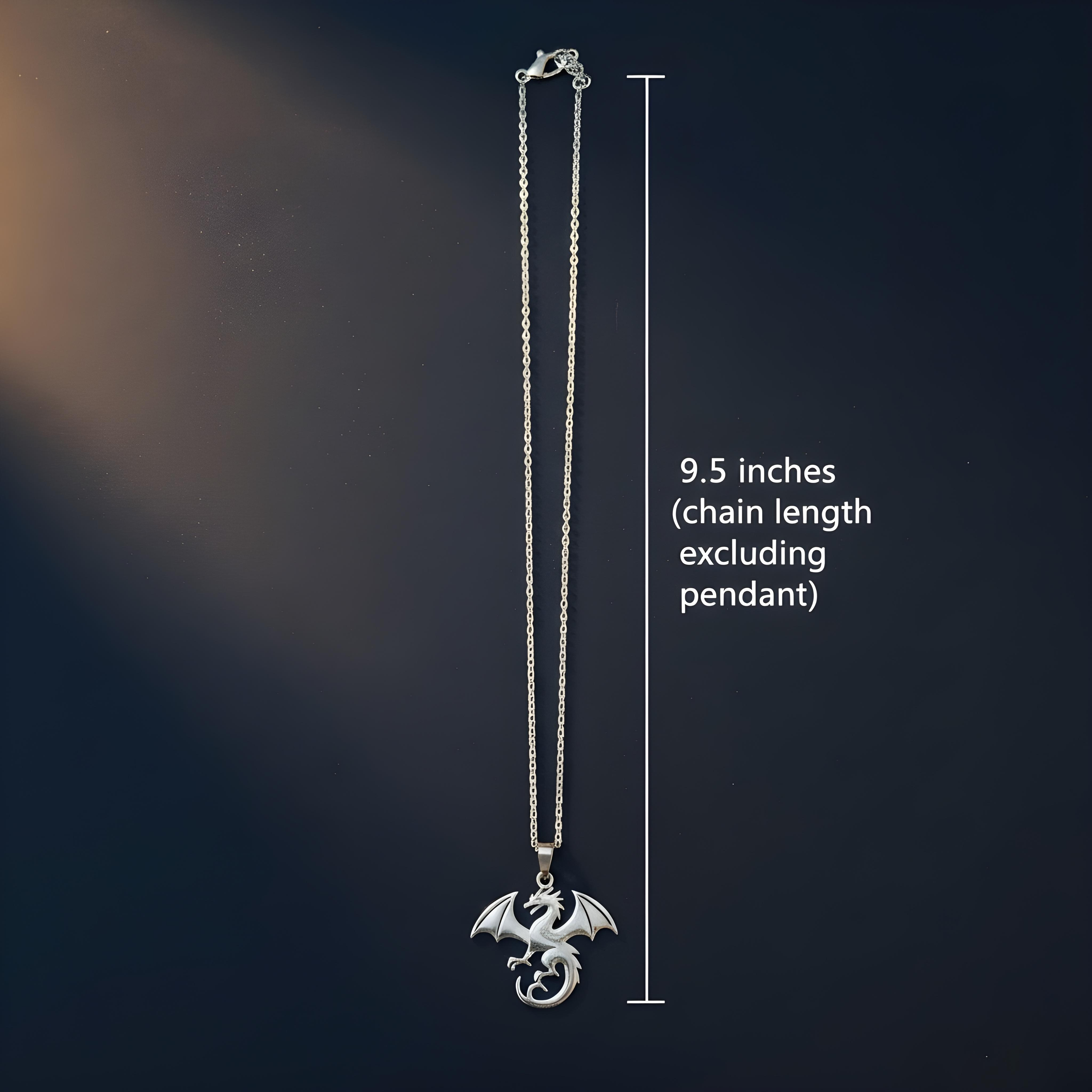 Silver dragon pendant necklace with chain length measurement on a dark background