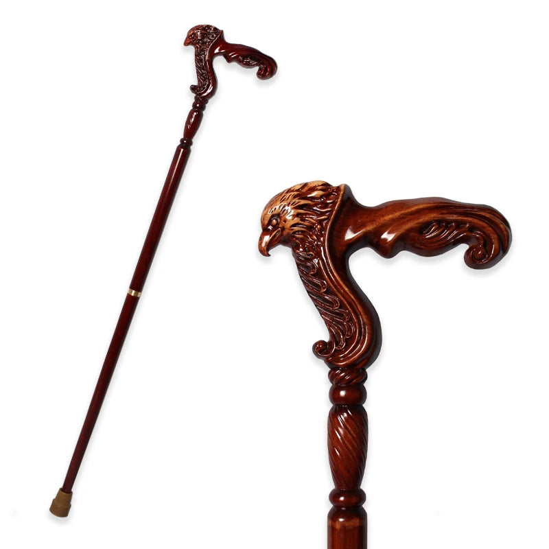 Wooden walking cane with detailed carvings on a white background