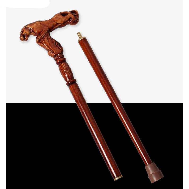 Wooden walking cane with animal head handle on a white background