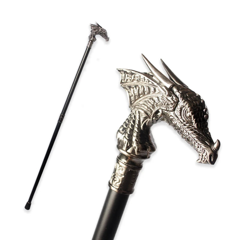 Decorative walking cane with dragon head design on a white background