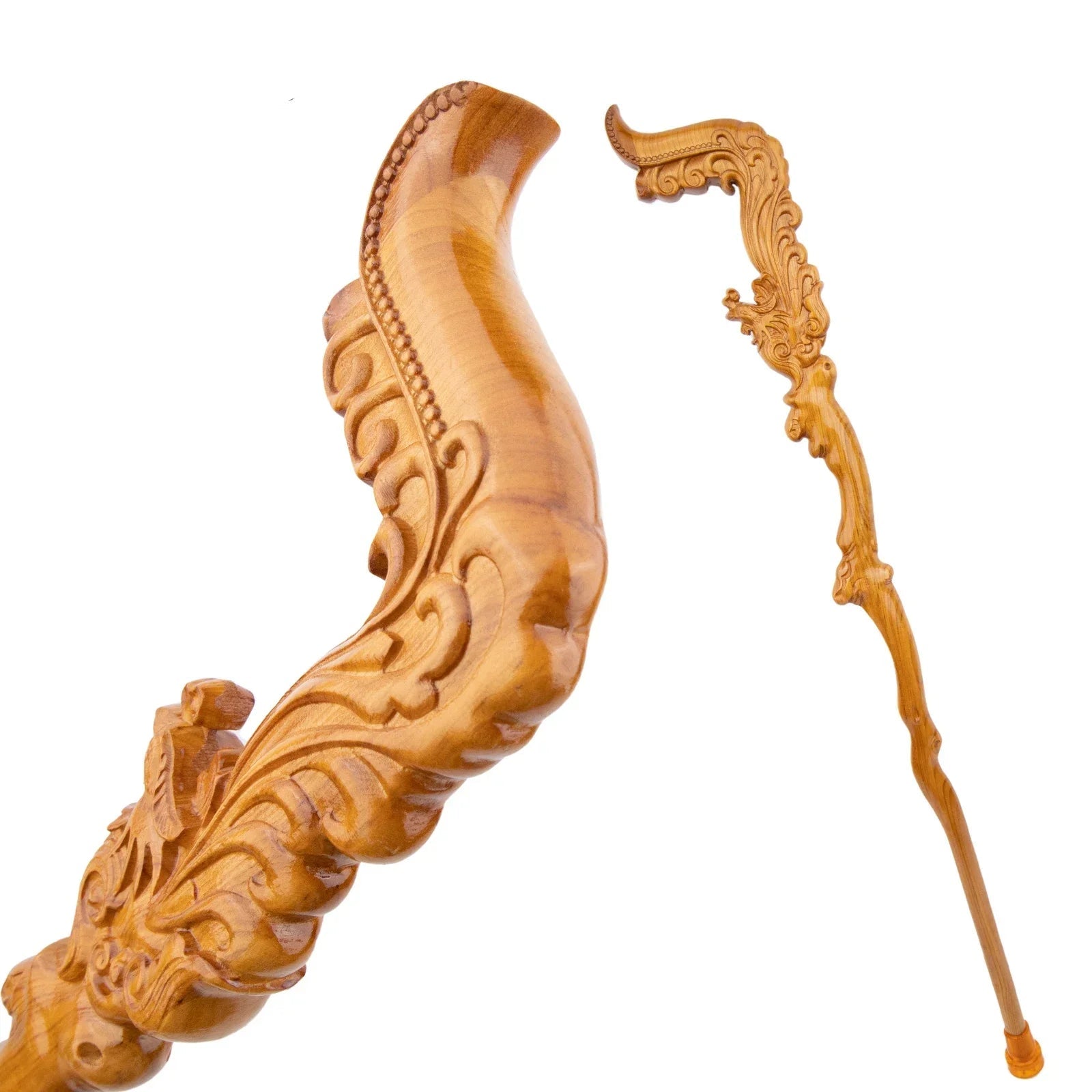 Decorative wooden walking stick with intricate carvings on a white background