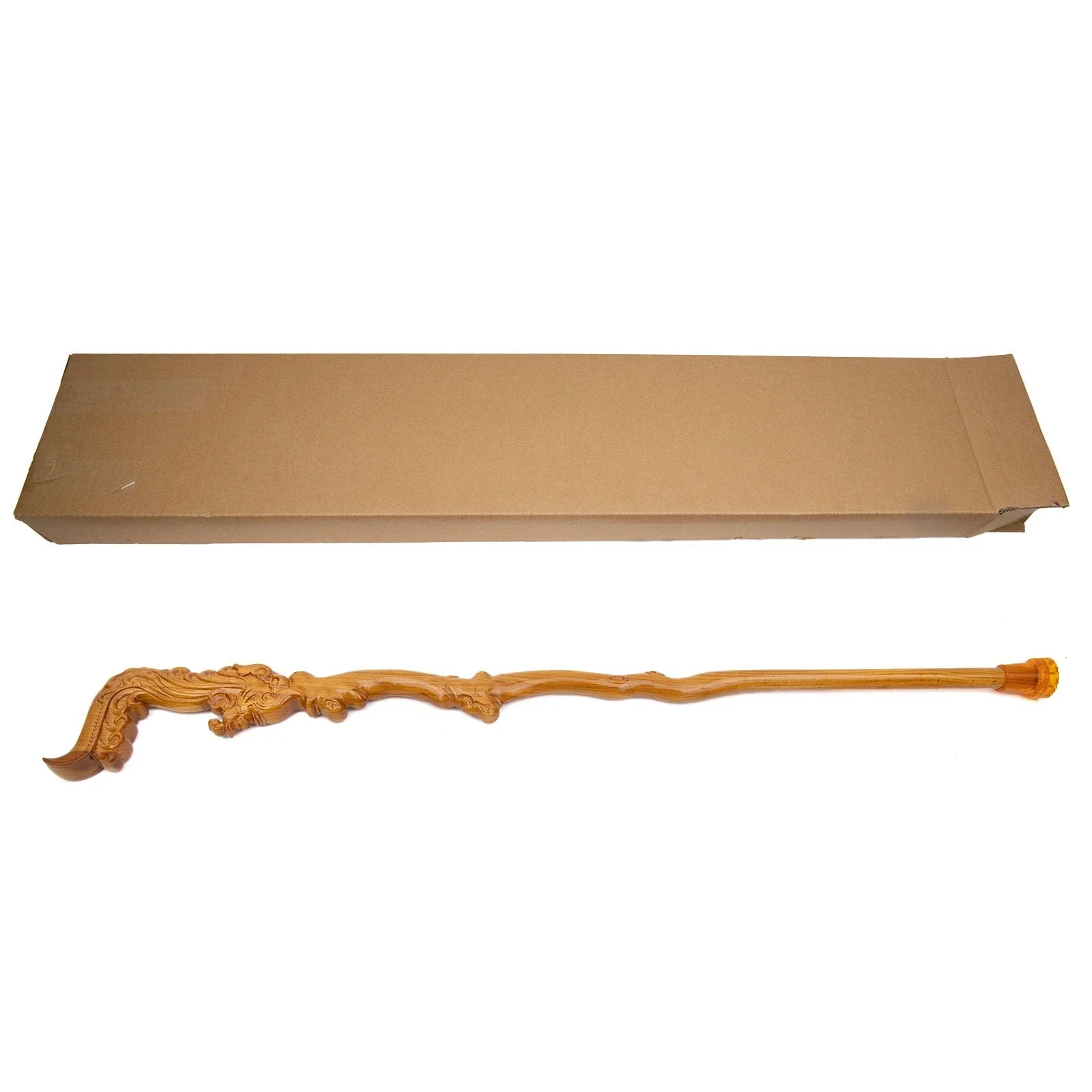 Wooden walking cane with decorative handle on a white background.